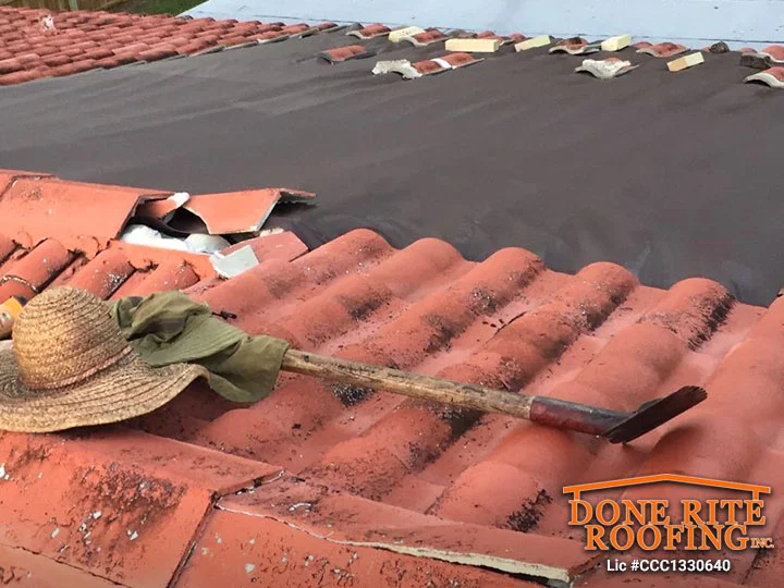 Removing tile Roof in preperation of roof replacement